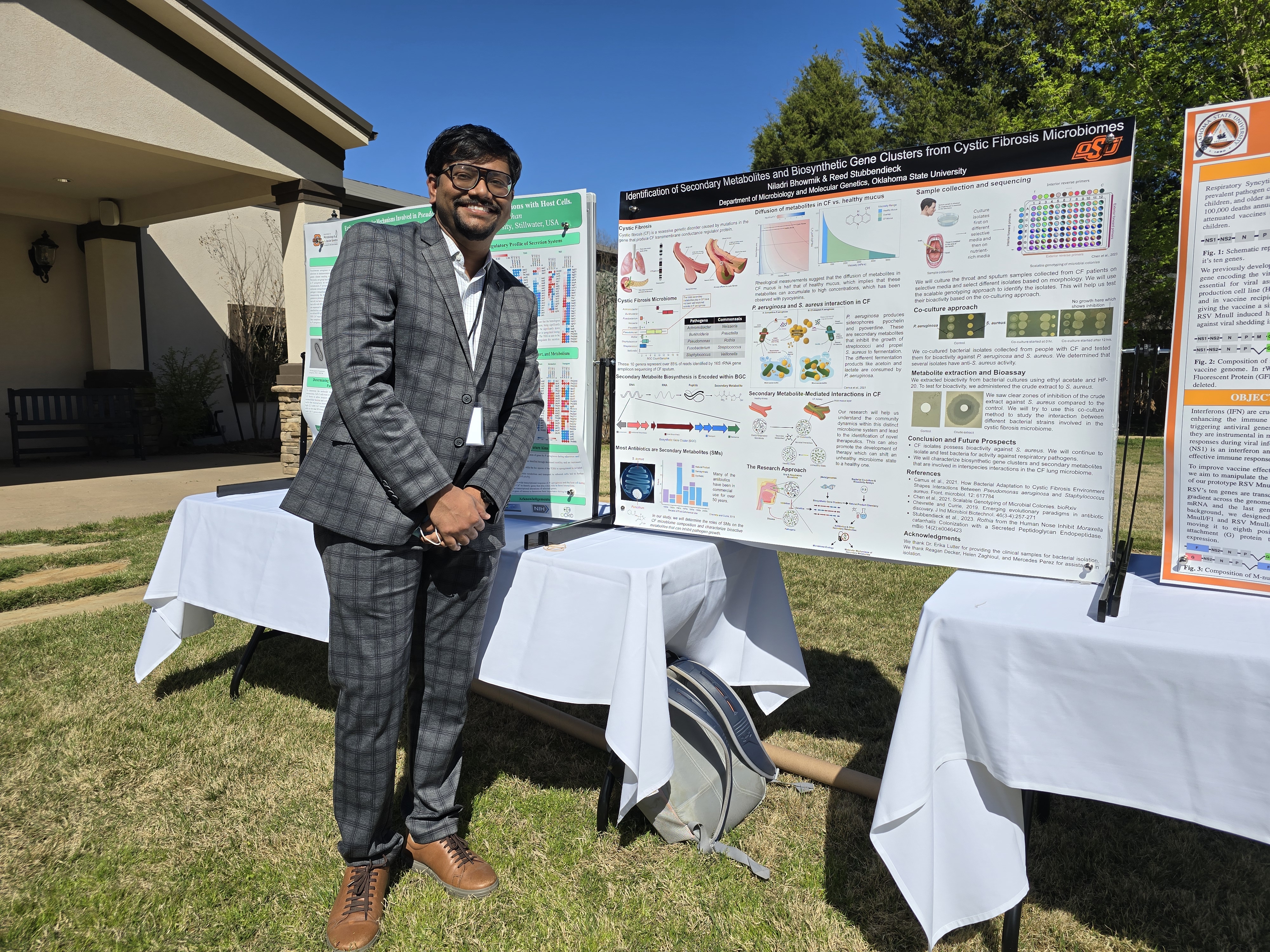Photograph of Niladri presenting his poster at the OCRID.