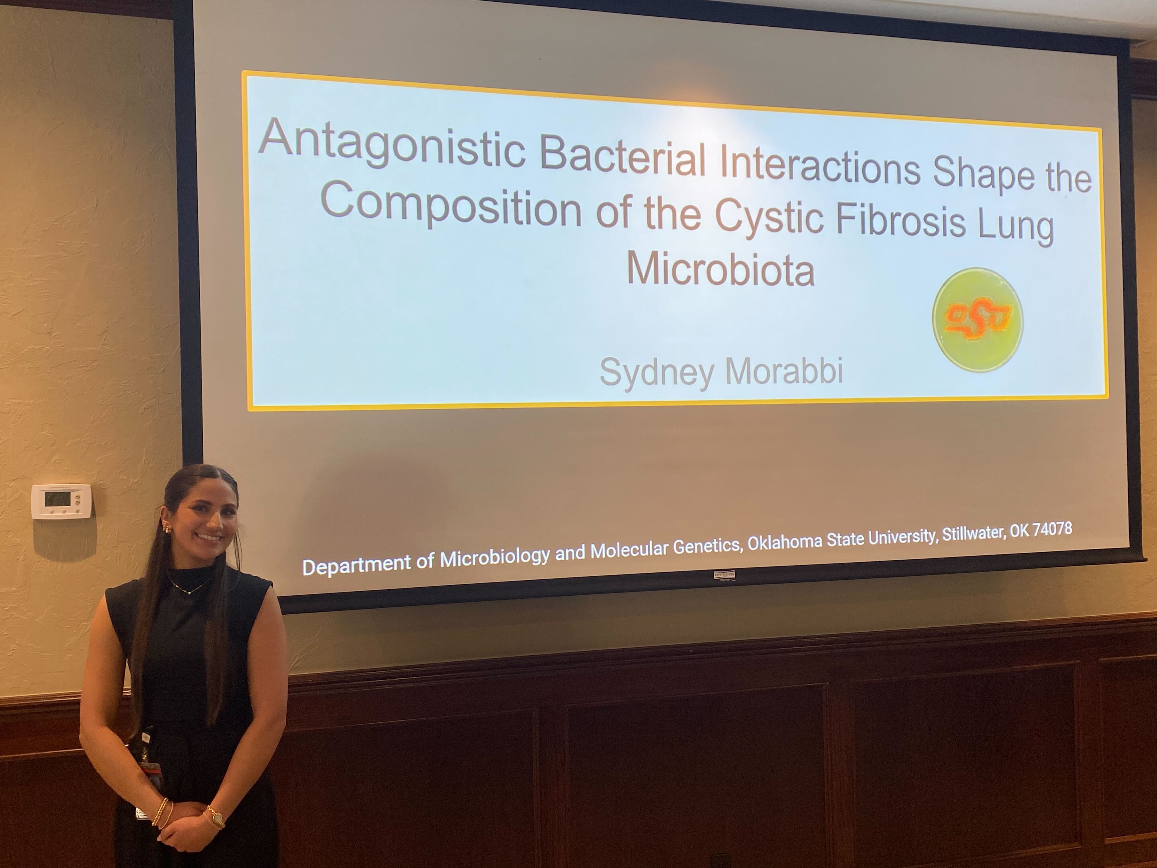 Sydney presenting her flash talk at the OCRID symposium.