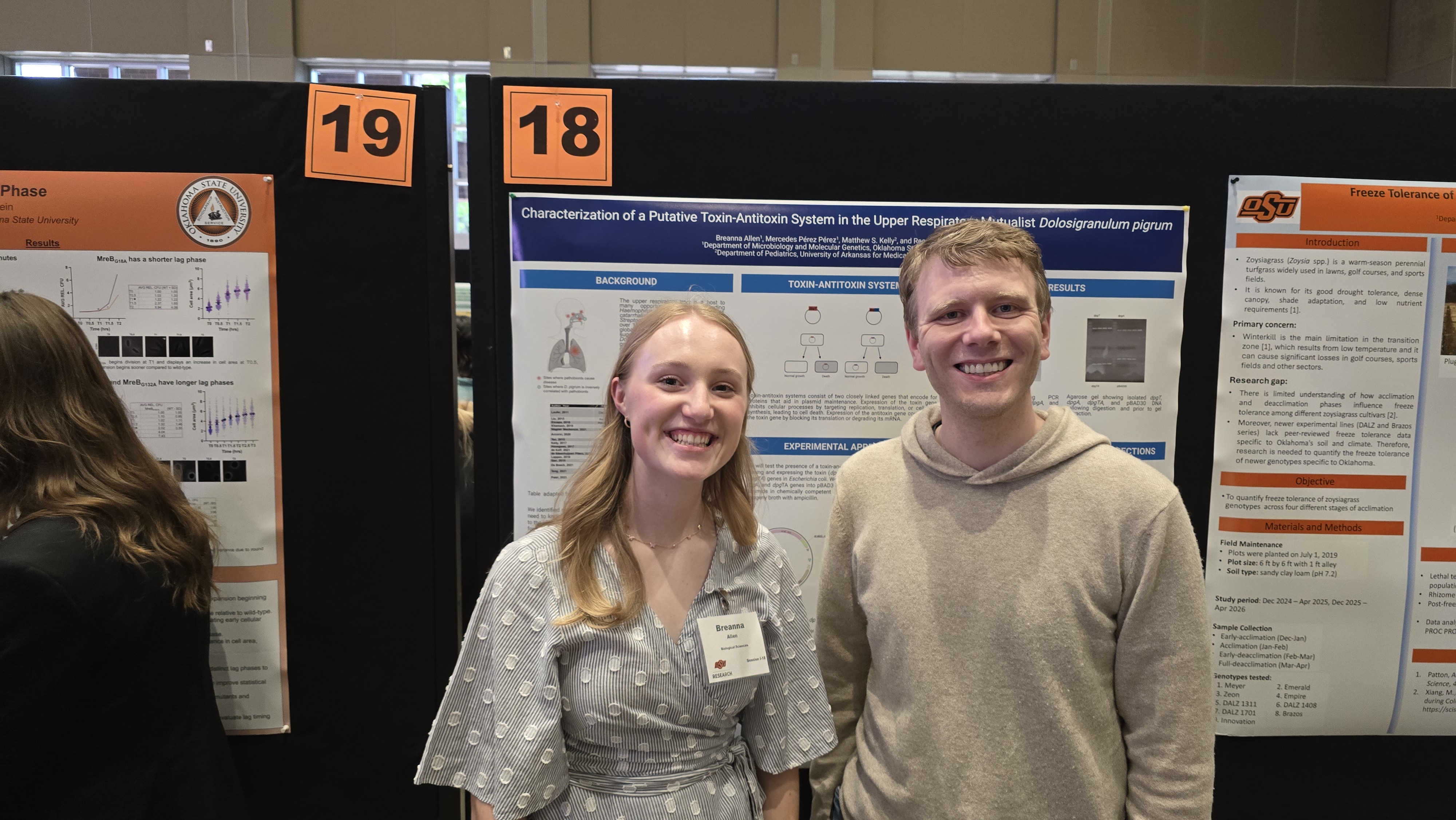 Bre and Reed in front of Bre's poster